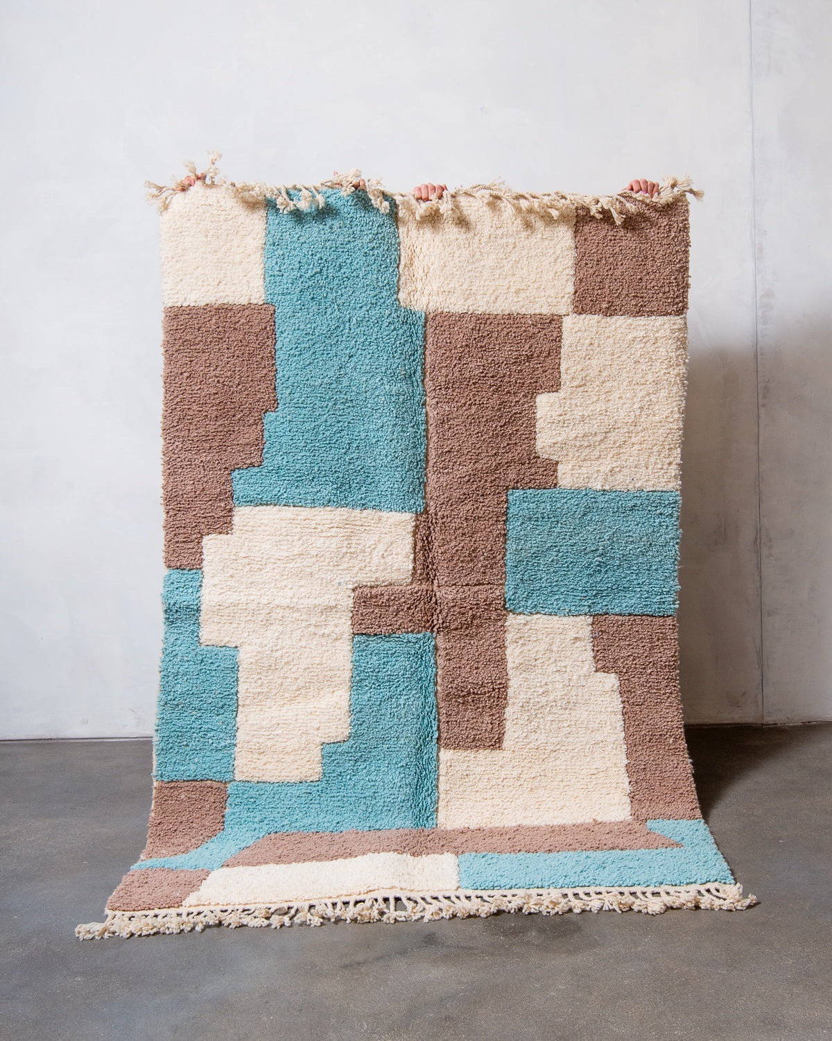 Modern, designer, handcrafted Berber rug from Morocco. Beniourain carpet with beautiful colours and patterns and fluffy wool texture.